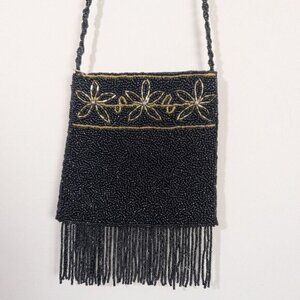 Black and gold beaded purse with fringe  fully beaded floral design